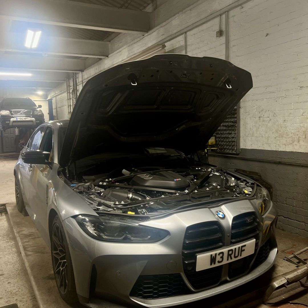BMW M3 Competition with the bonnet up at 5 Star Motors